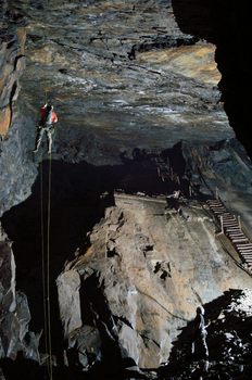 Abseiling from lofty heights underground adventure exploring caving